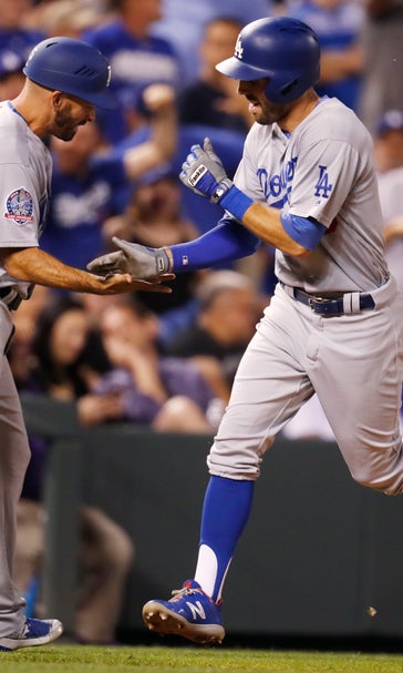 Taylor, Dozier homer in ninth as Dodgers beat Rockies 8-5